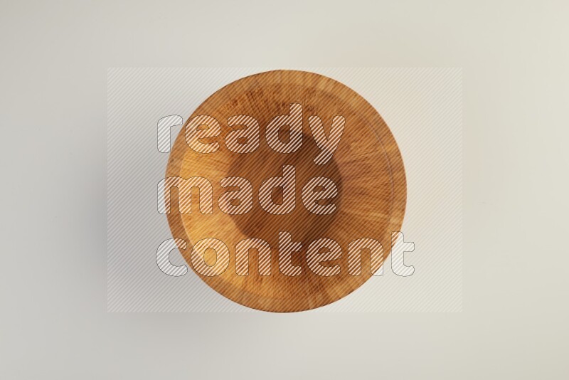 Wooden bowl and plate on white background