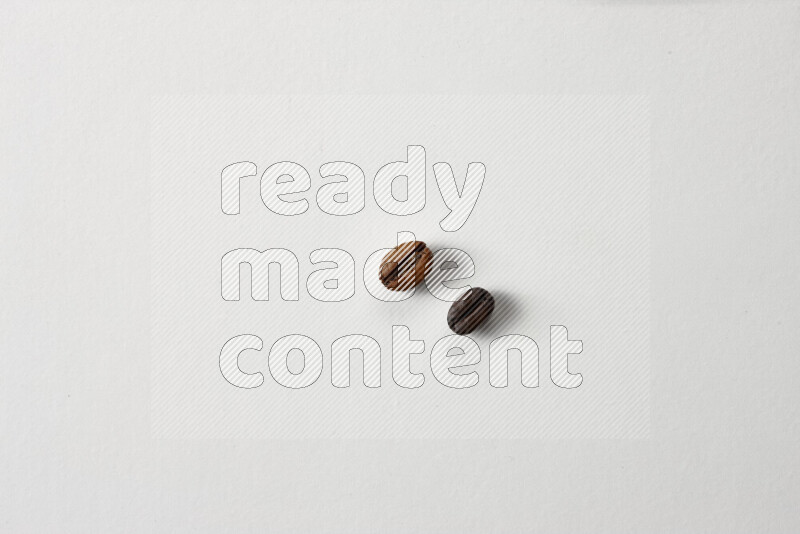 Roasted coffee beans on white background