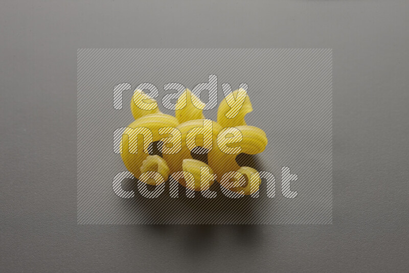 Twist pasta on grey background