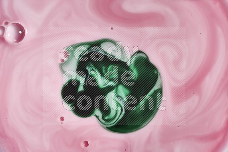 A close-up of abstract swirling patterns in red and green