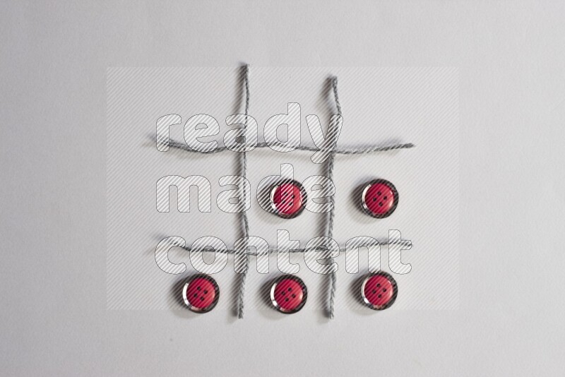 Red buttons placed on grey background