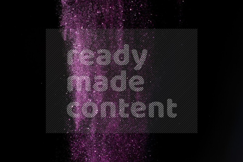 Pink glitter powder isolated on black background