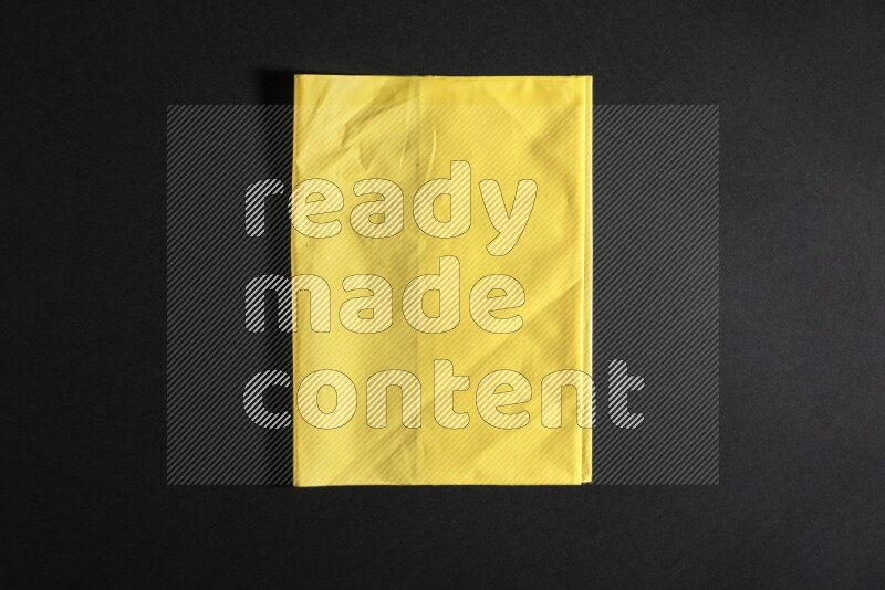 Colored plastic textures on black background