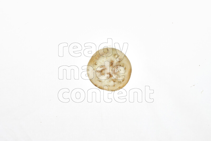 Eggplant slices on illuminated white background