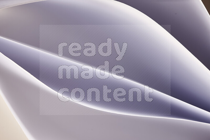 This image showcases an abstract paper art composition with paper curves in white created by light