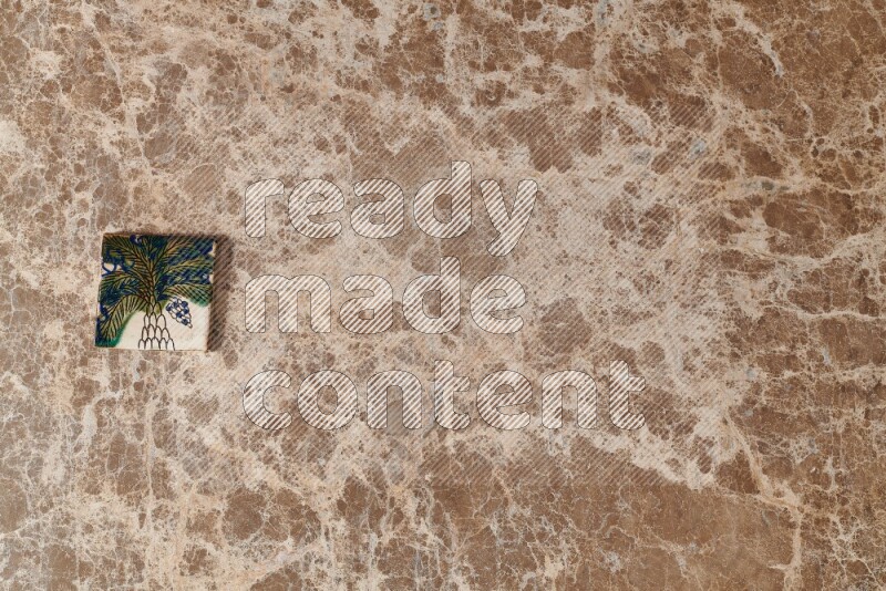 A decorative coaster on beige marble background