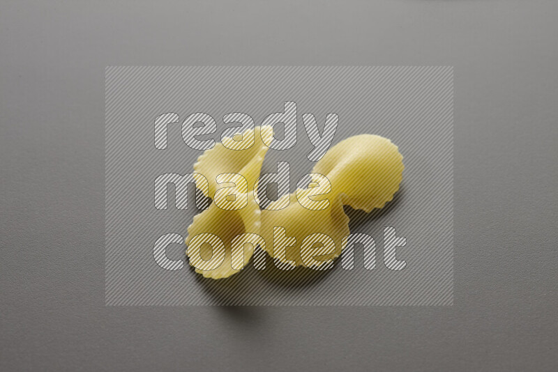 Fiocchi pasta on grey background