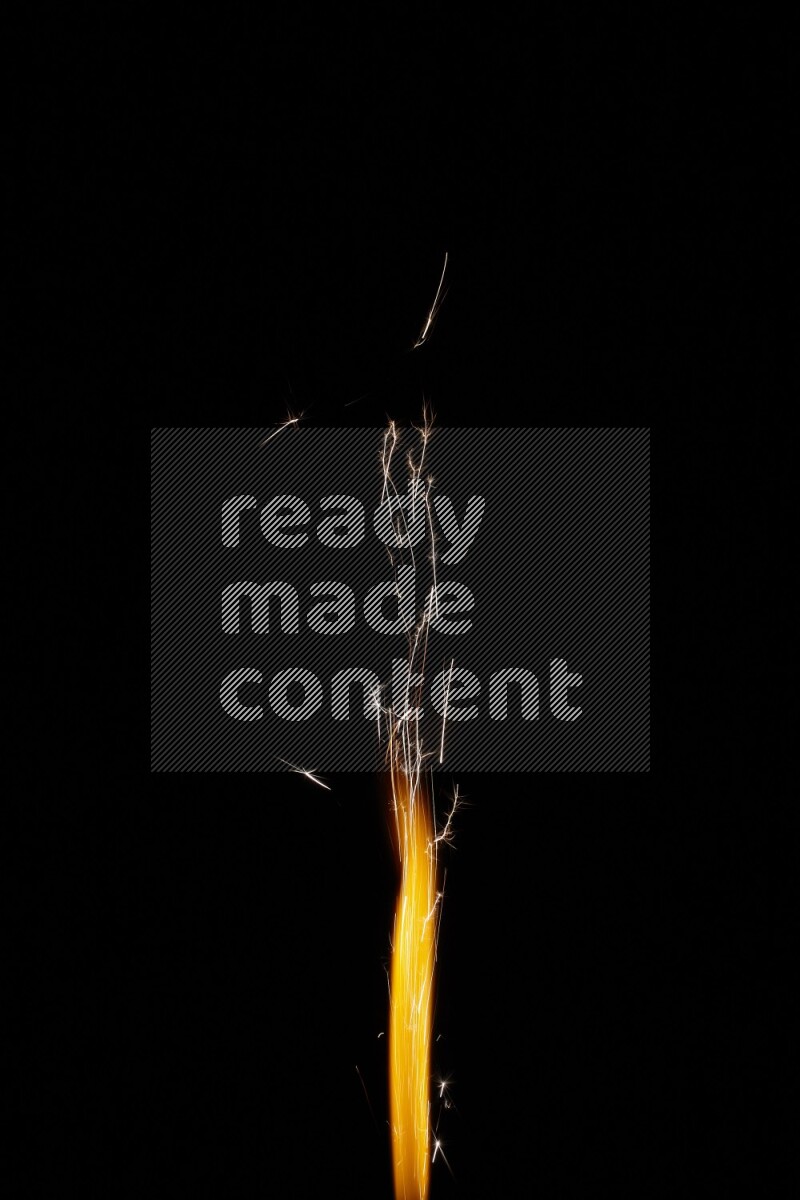 Sparkler candle isolated on black background