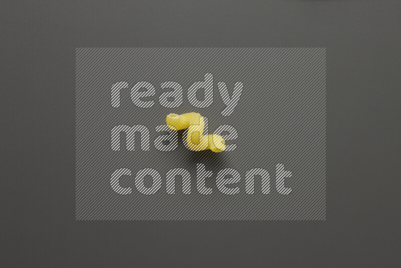 Twist pasta on grey background