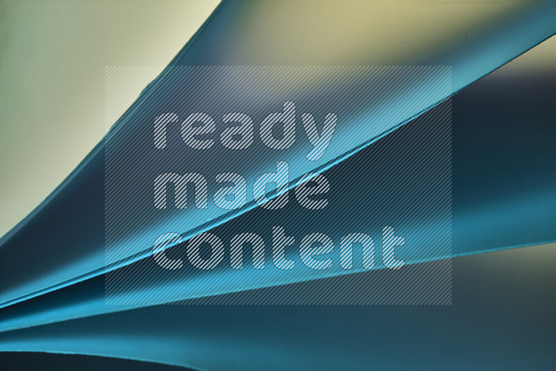 An abstract art piece displaying smooth curves in cold gradients created by colored light