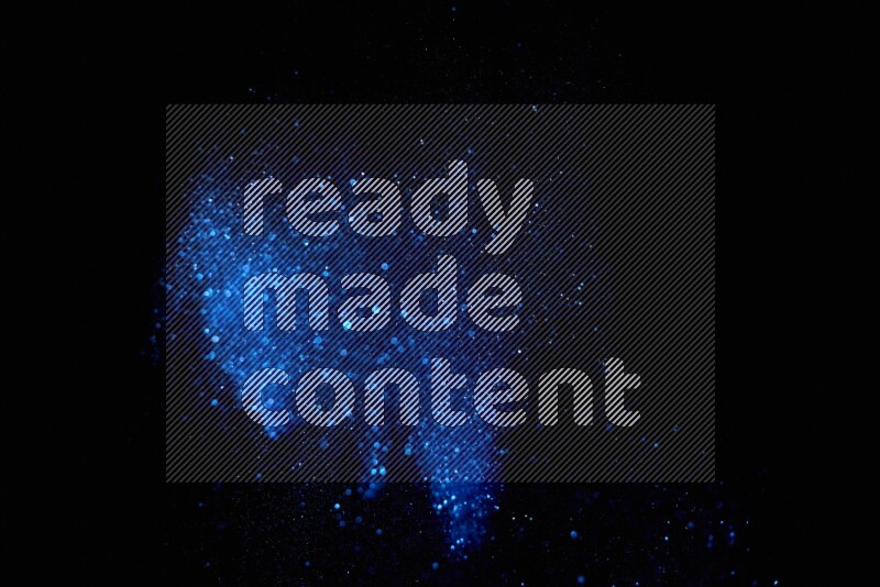Blue glitter powder isolated on black background