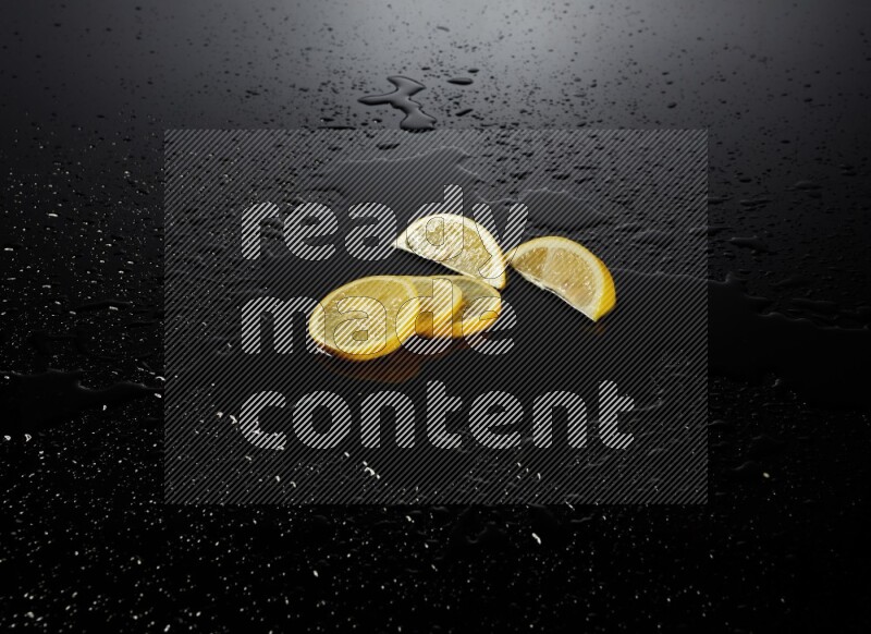 Lemon slices with water drops, and droplets on black background