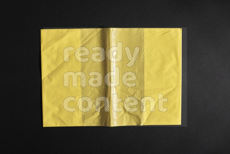 Colored plastic textures on black background