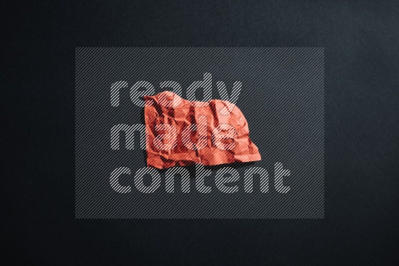 White paper sheet on black background