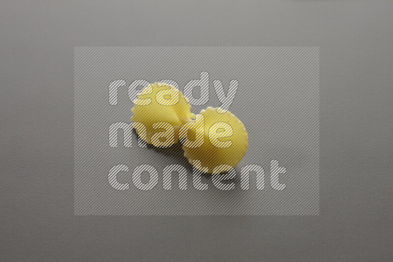 Fiocchi pasta on grey background