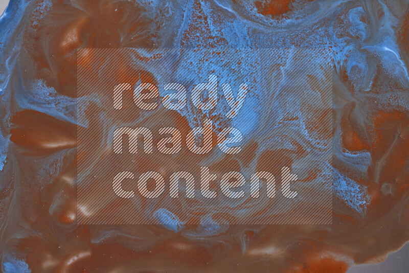 Abstract colorful background with mixed of orange and blue paint colors