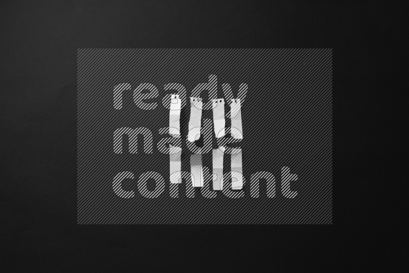 Ripped notebook sheet on black background