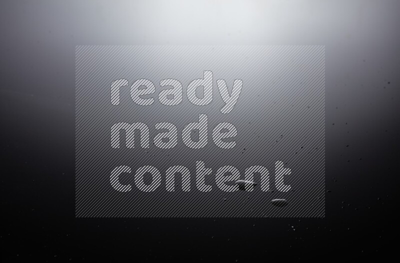 water drops, and droplets on black background