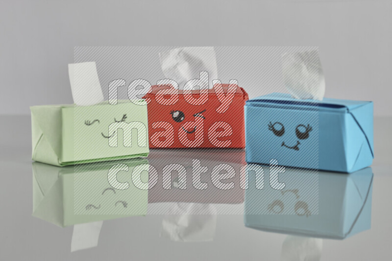 Origami tissue box on grey background