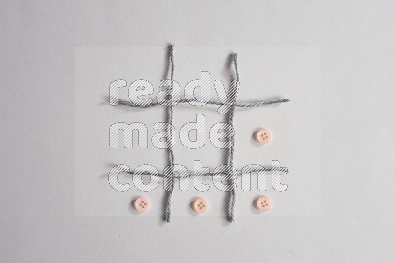 Rose buttons placed on grey background