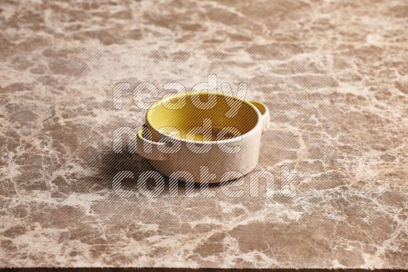 Multicolored Pottery Bowl on Beige Marble Flooring