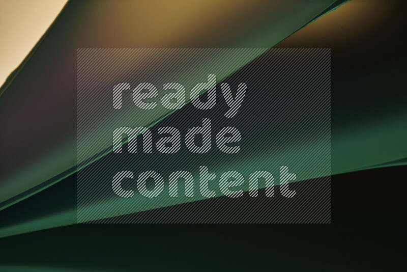 فن تجريدي يعرض منحنيات مع تدرجات الألوان الدافئة والباردة مكونه بضوء ملون