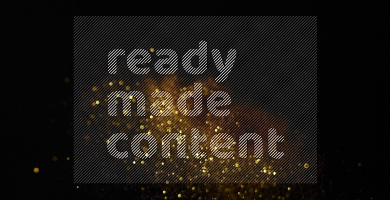 Gold glitter powder isolated on black background