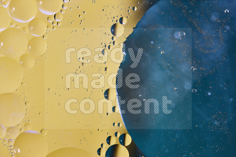 Close-ups of abstract oil bubbles on water surface in shades of blue and yellow