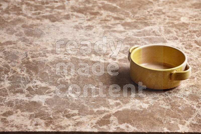 Multicolored Pottery Bowl on Beige Marble Flooring