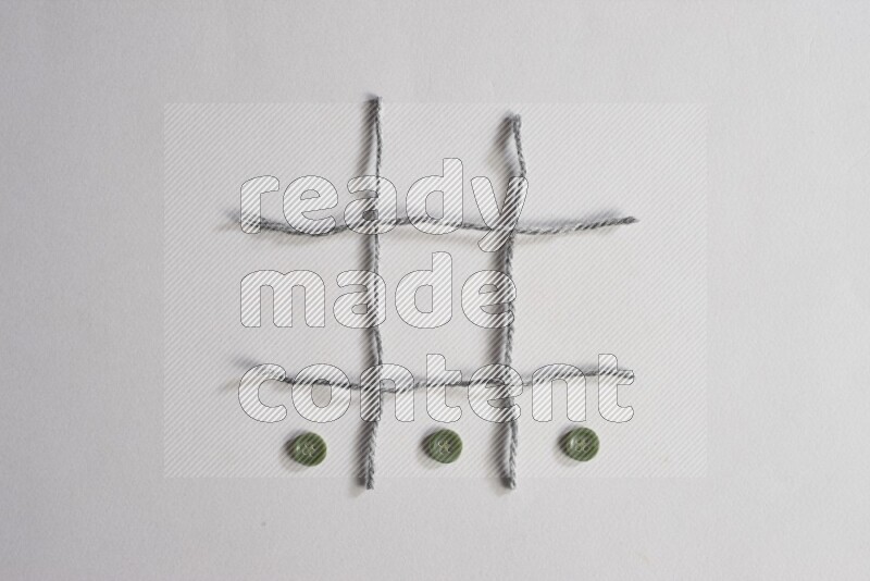 Green buttons placed on grey background