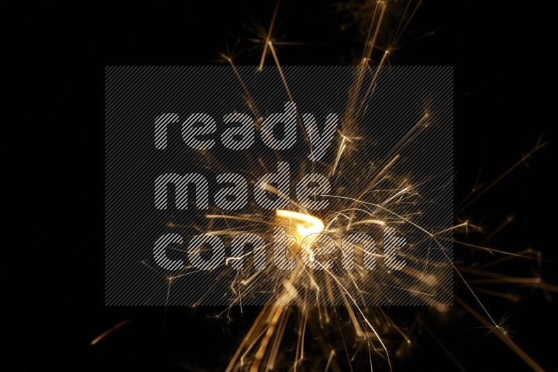 Sparkler candle isolated on black background