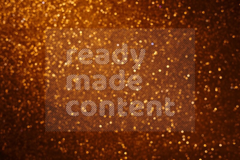 Orange glittery bokeh background
