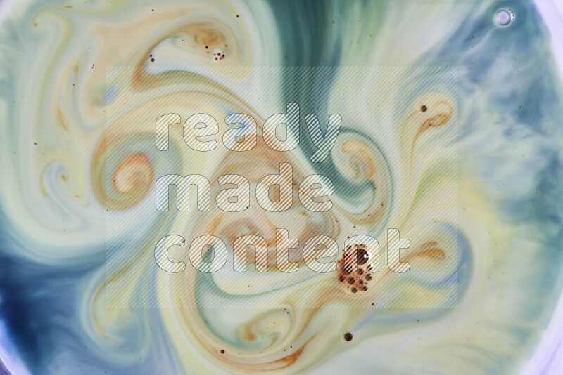 A close-up of abstract swirling patterns in green, blue and red