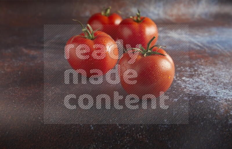45 degree roma tomato on a textured reddish rustic metal background