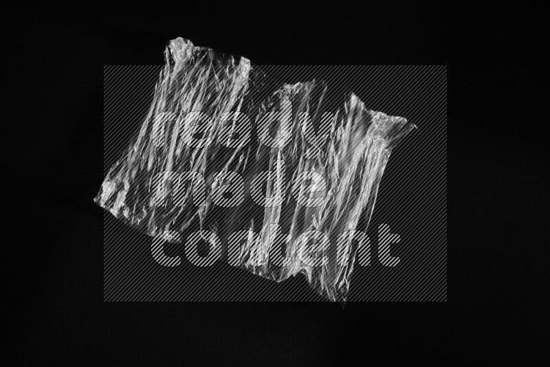 Transparent plastic textures on black background