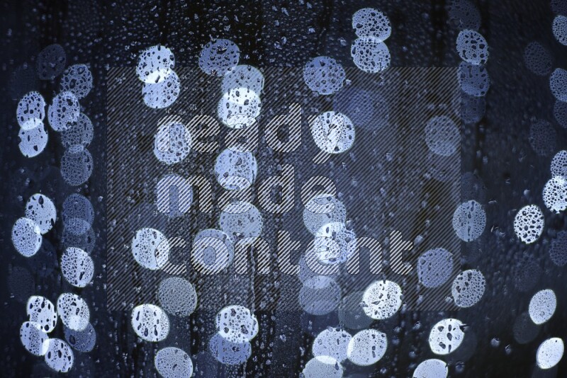 Bokeh light in white with water drops
