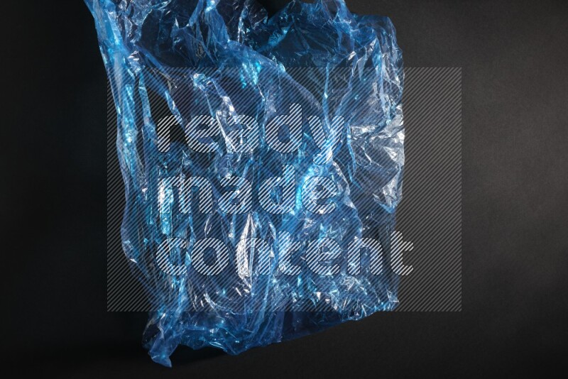 Colored plastic textures on black background