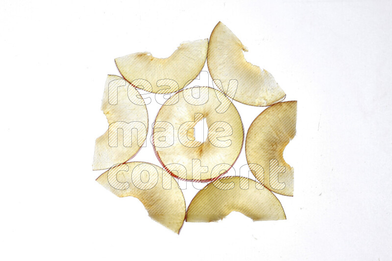 Peach slices on illuminated white background