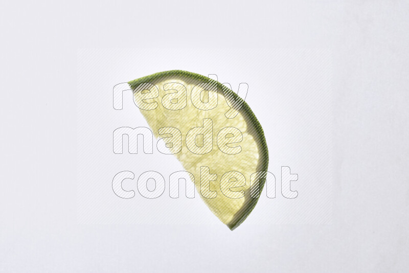 Orange slices on illuminated white background