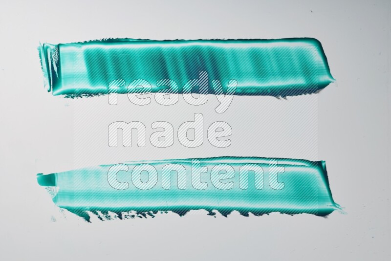 Turquoise painting knife strokes on white background