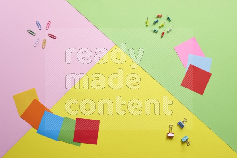 Different school supplies on multicolored background