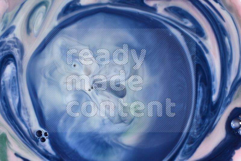 A close-up of abstract swirling patterns in blue and white