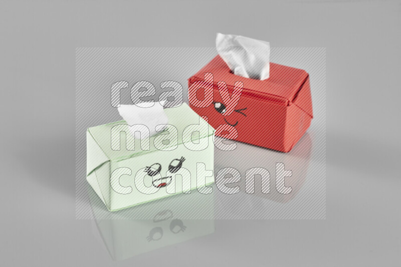 Origami tissue box on grey background
