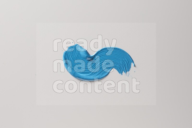 A single blue S curved brush stroke on a white background