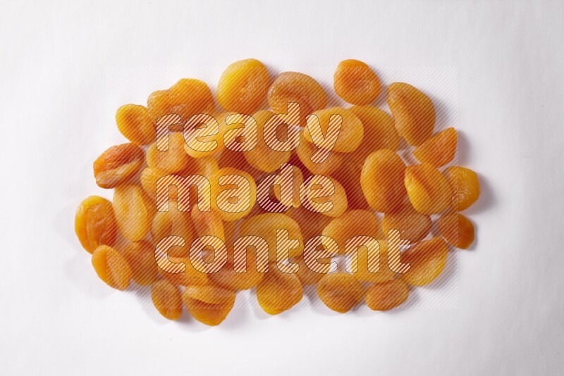 Dried apricots on white background