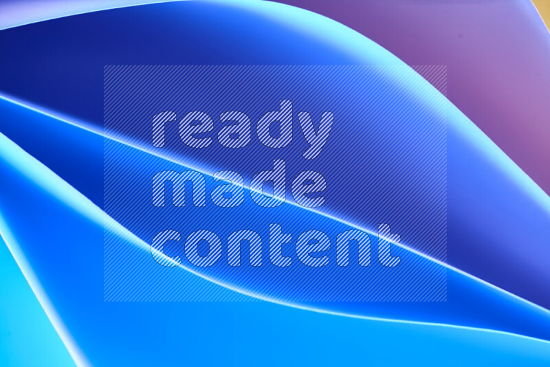 This image showcases an abstract paper art composition with paper curves in blue, purlpe and pink gradients created by colored light