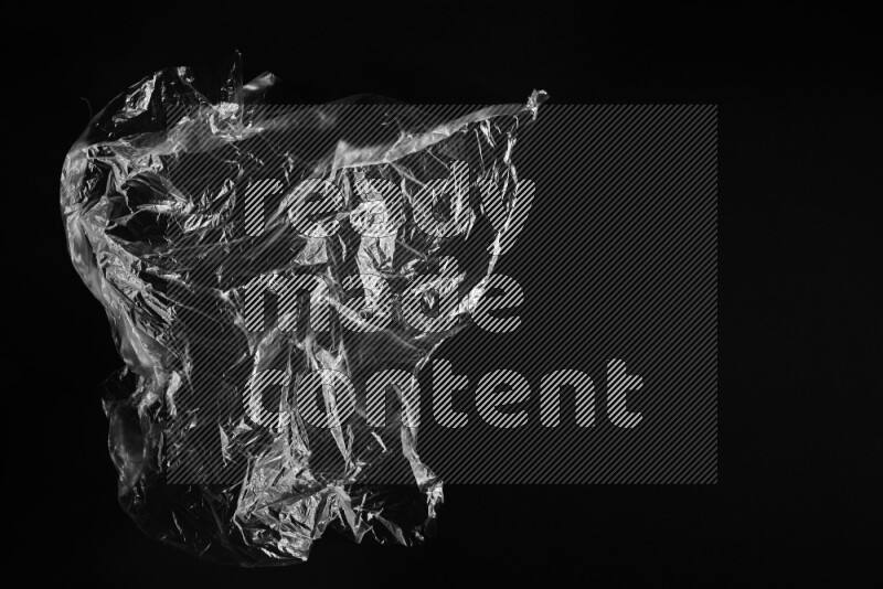Transparent plastic textures on black background