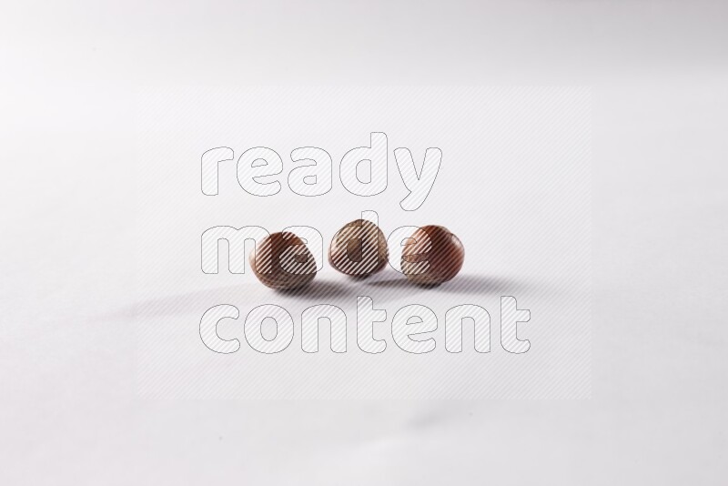 Hazelnuts on white background