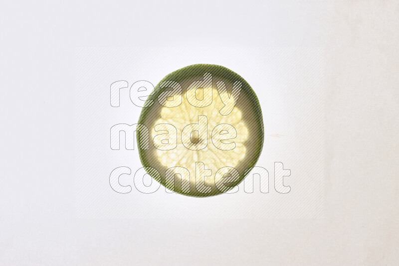 Orange slices on illuminated white background