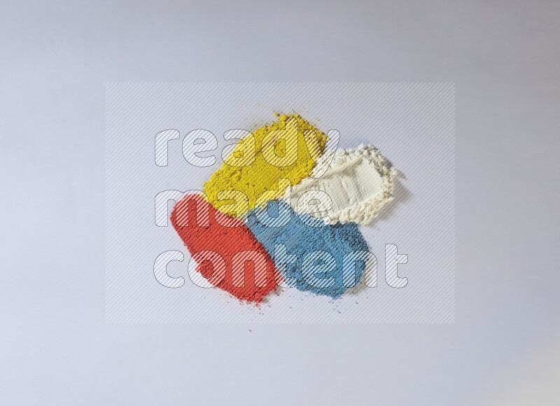 Multicolored powder smears on white background